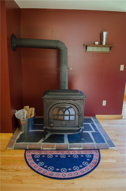 384 Plymouth Road Etna, ME 04434 - Photo 9 of 29 Wood stove for supplemental heat