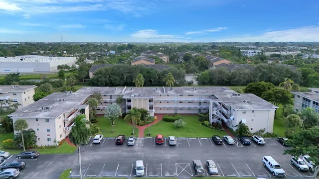 an aerial view of a house with a garden