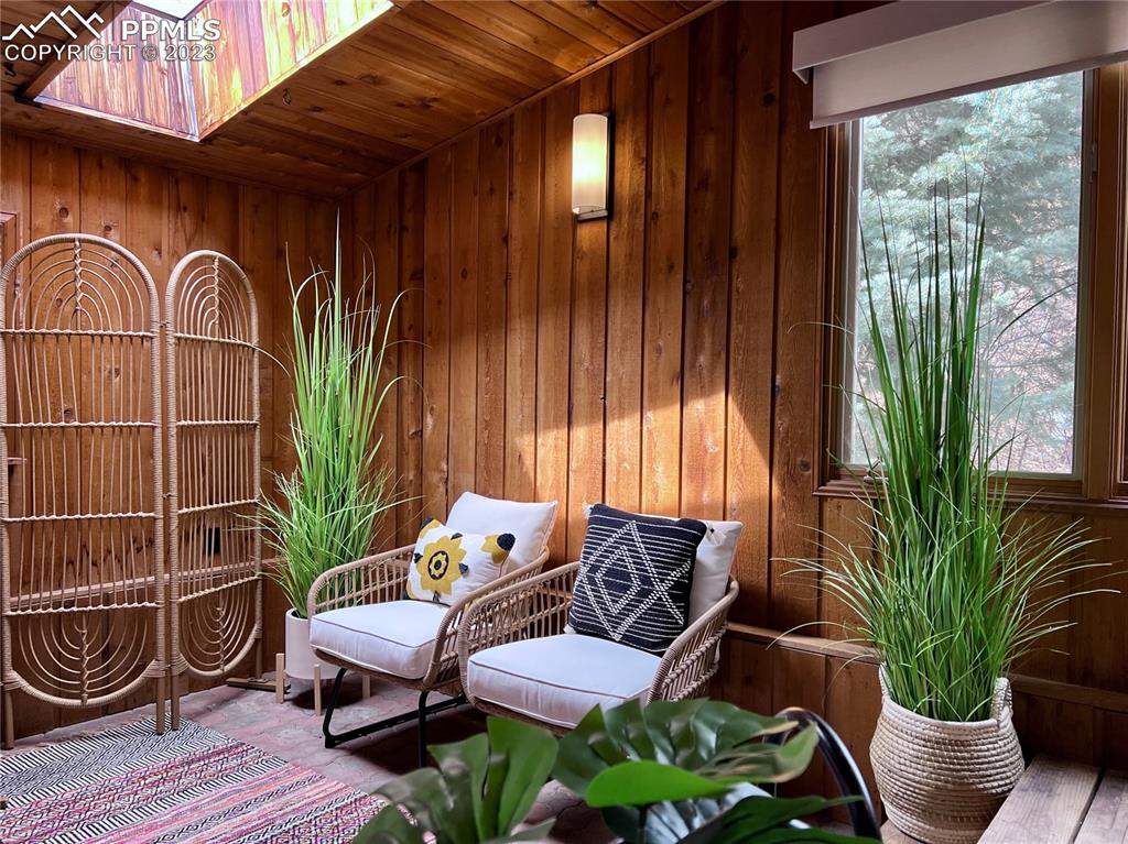 9660 Mohawk Trail Cascade, CO 80809 - Photo 11 of 43 a couple of potted plants in front of door