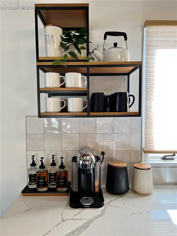 9660 Mohawk Trail Cascade, CO 80809 - Photo 17 of 43 a bathroom with a toilet and a sink