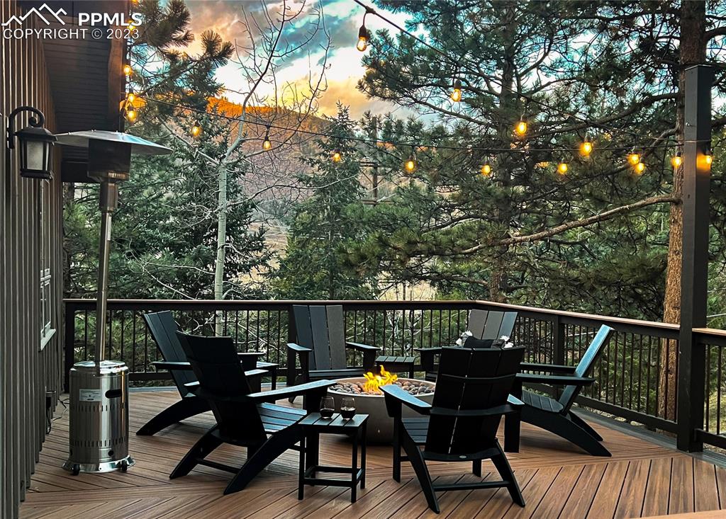 9660 Mohawk Trail Cascade, CO 80809 - Photo 2 of 43 a view of a balcony with chairs