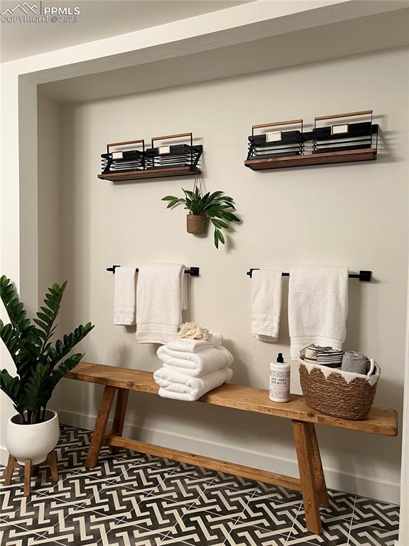 9660 Mohawk Trail Cascade, CO 80809 - Photo 32 of 43 a bathroom with a sink and a mirror