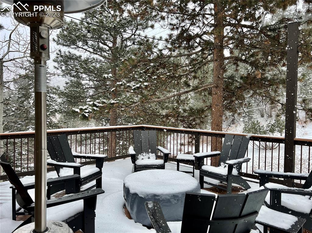 9660 Mohawk Trail Cascade, CO 80809 - Photo 35 of 43 a view of a balcony with chairs