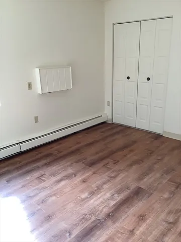 a utility room with cabinets