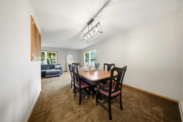 a view of a dining room with furniture