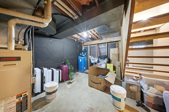 a view of a room with wooden furniture