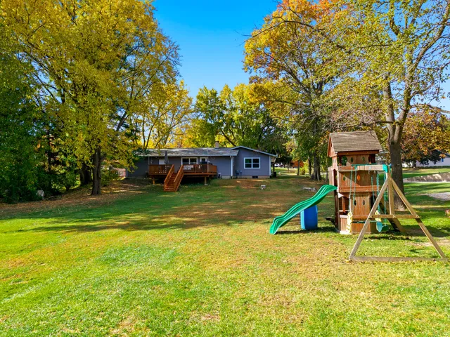 a view of a house with a big yard