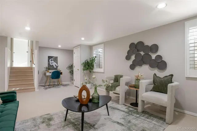 a living room with furniture and rug