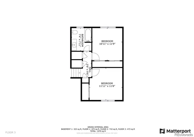 a picture of a room with a white wall and a large window