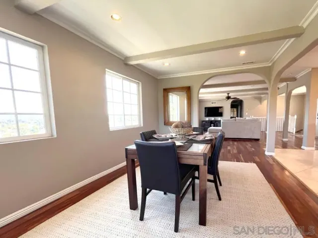a view of a dining room with furniture