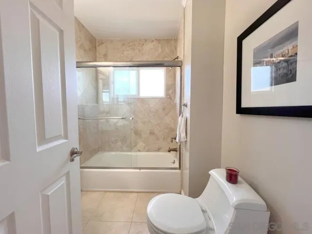 a view of house with outdoor seating area