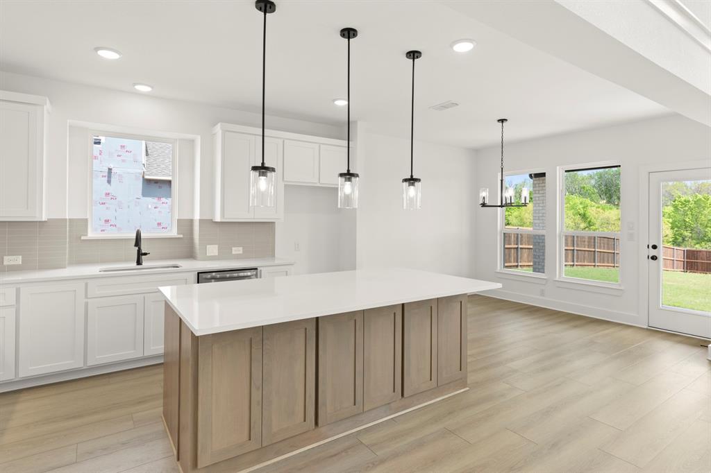 937 Gold Finch Lane Forney, TX 75126 - Photo 13 of 26 13. 937 Gold Finch - Kitchen (3)