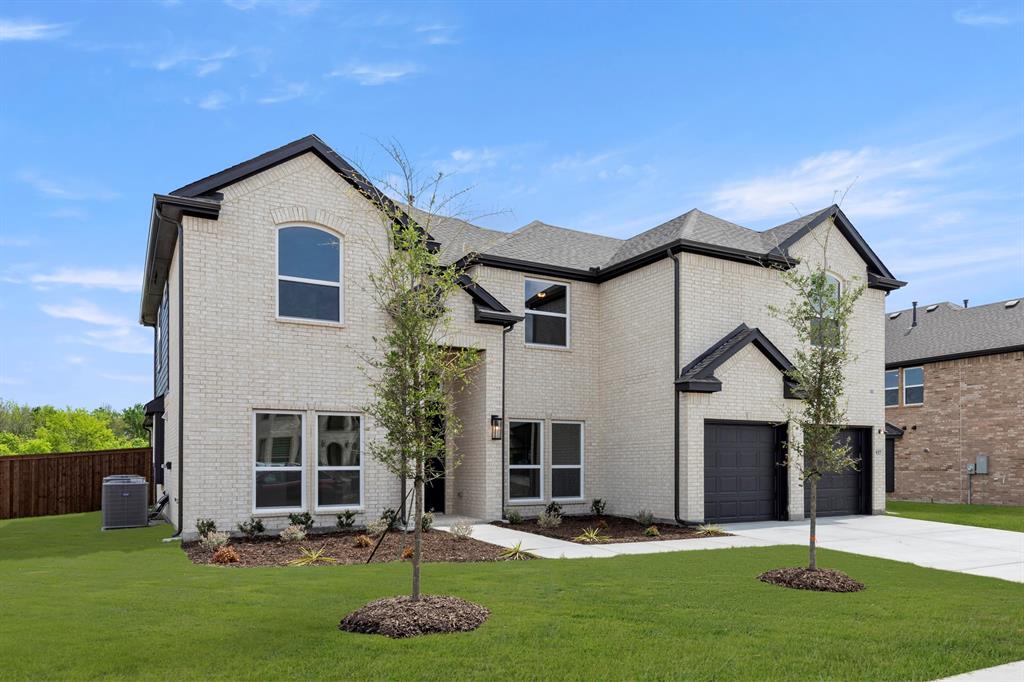 937 Gold Finch Lane Forney, TX 75126 - Photo 2 of 26 02. 937 Gold Finch - Front (2)