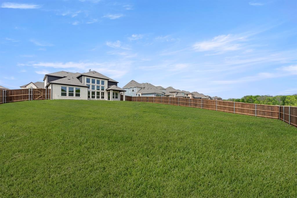 937 Gold Finch Lane Forney, TX 75126 - Photo 26 of 26 26. 937 Gold Finch - Back (2)