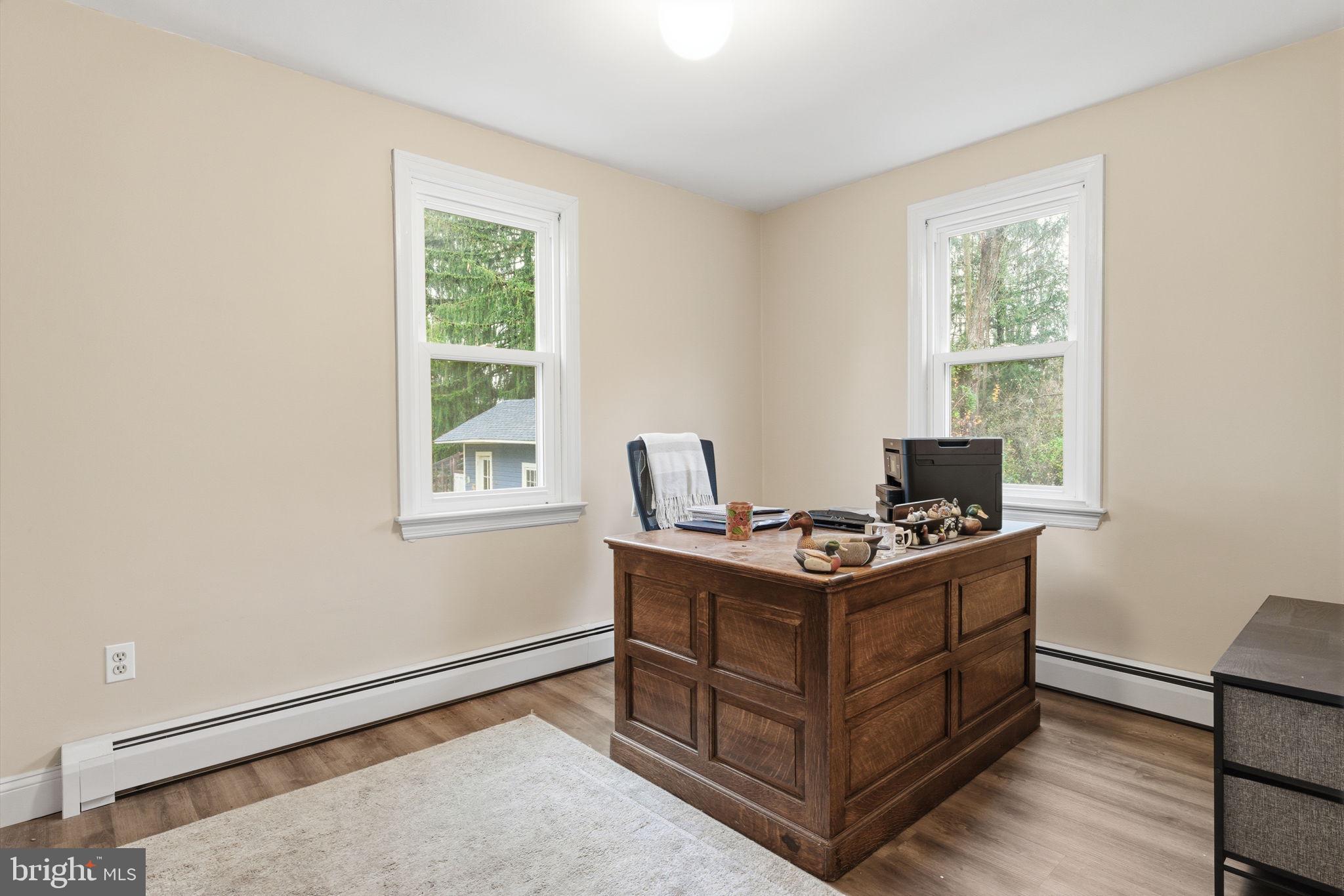131 Crusher Road Hopewell, NJ 08525 - Photo 14 of 41 a living room with furniture and a window