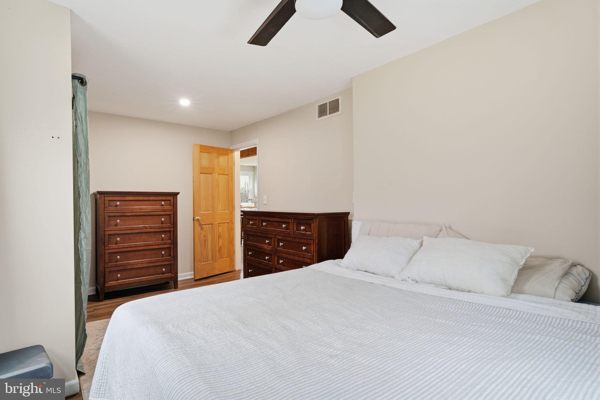 131 Crusher Road Hopewell, NJ 08525 - Photo 20 of 41 a bedroom with a bed and furniture