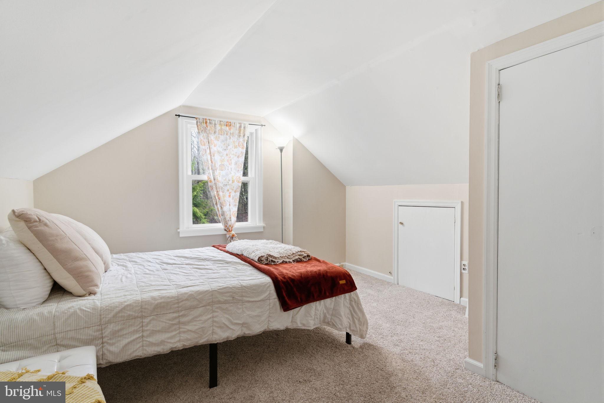 131 Crusher Road Hopewell, NJ 08525 - Photo 22 of 41 a bedroom with a bed and window