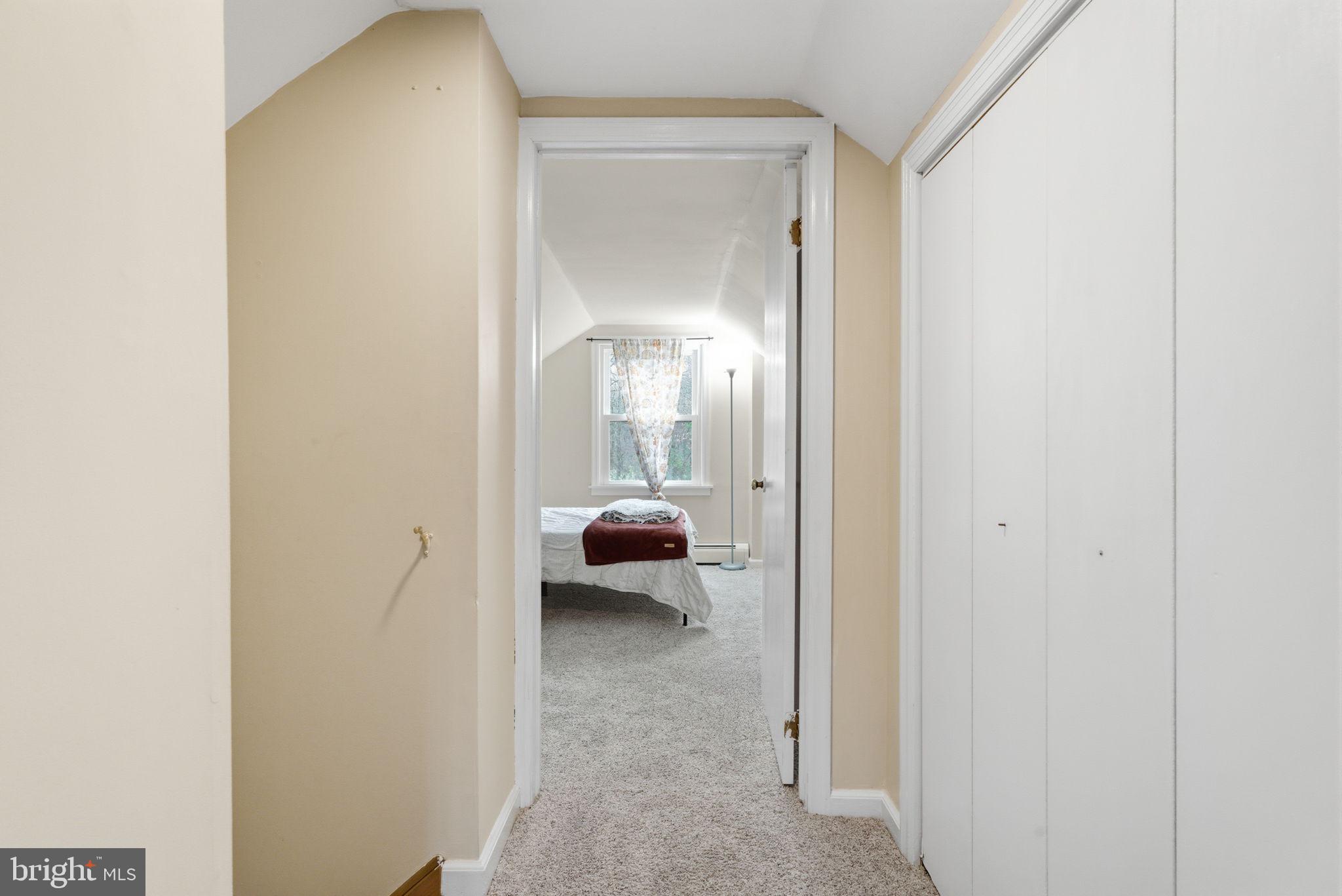131 Crusher Road Hopewell, NJ 08525 - Photo 25 of 41 a view of a bedroom from a hallway
