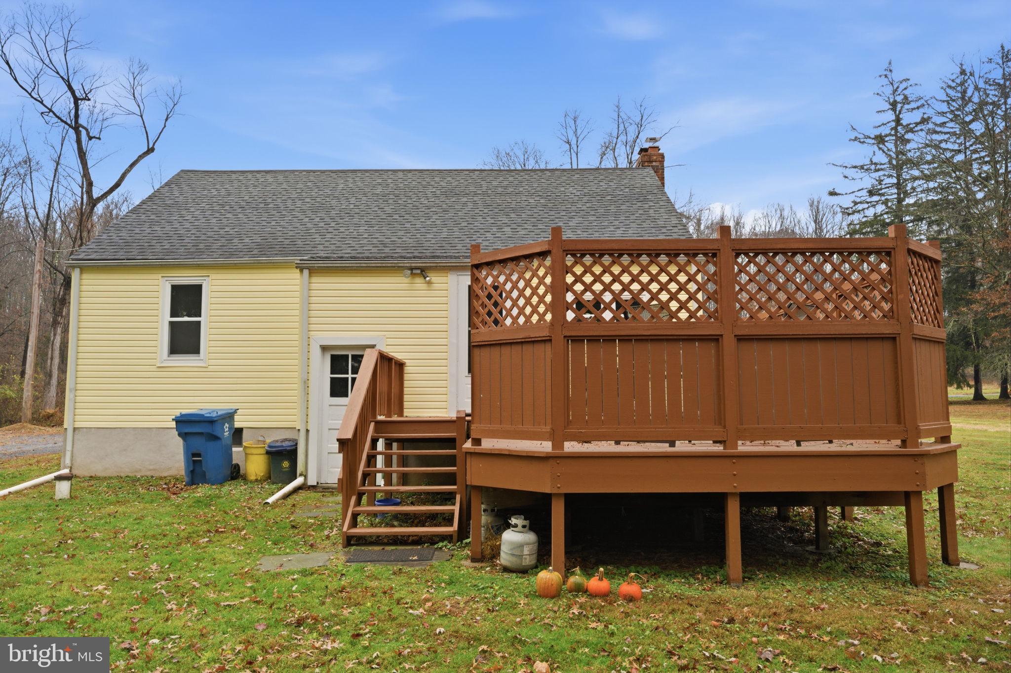 131 Crusher Road Hopewell, NJ 08525 - Photo 41 of 41 a view of a backyard with a chair and a table