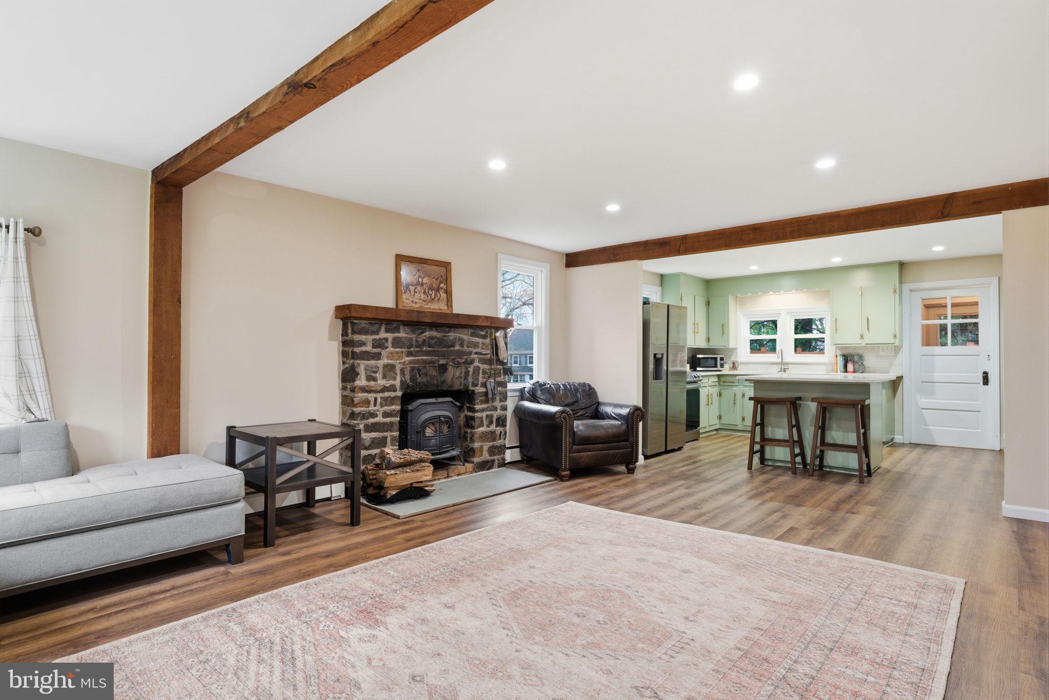 131 Crusher Road Hopewell, NJ 08525 - Photo 5 of 41 a living room with furniture and a fireplace