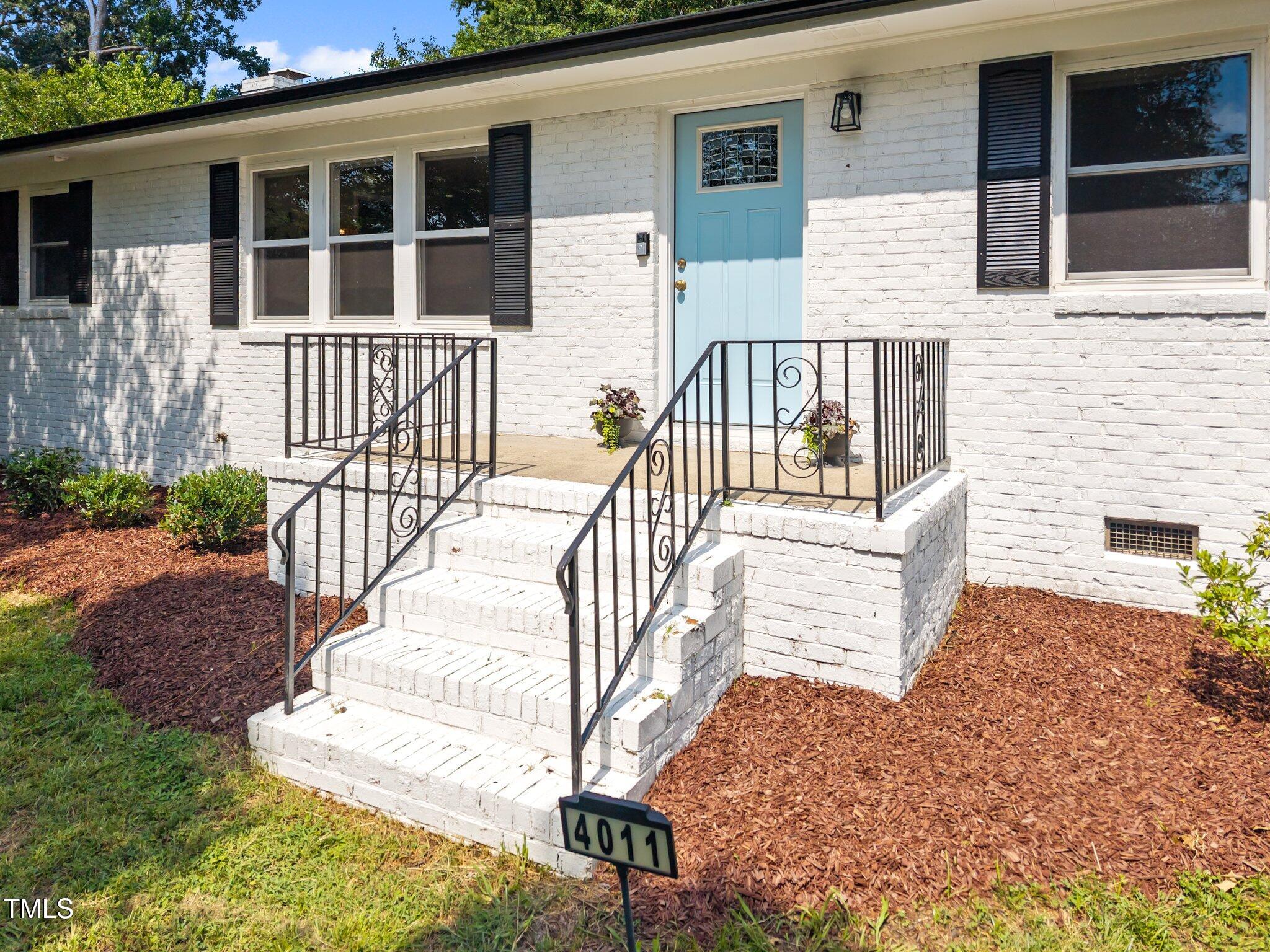 4011 Garrett Road Durham, NC 27707 - Photo 3 of 46 6-web-or-mls-DJI_20250707152655_0563_D