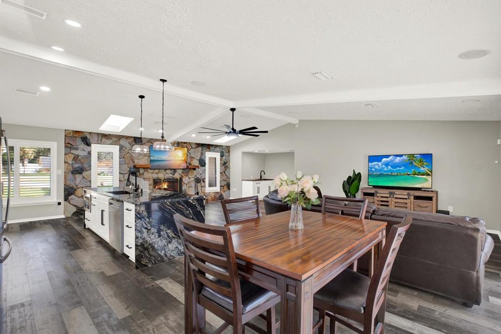 7487 River Country Drive Weeki Wachee, FL 34607 - Photo 13 of 53 a view of a dining room with furniture