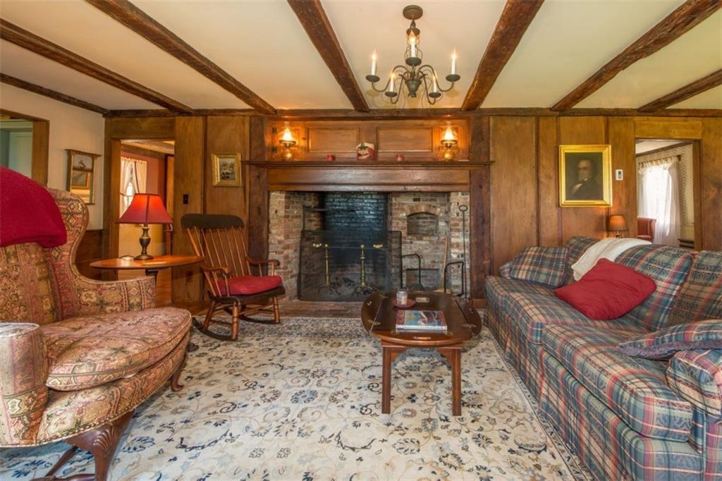 49 Meadow Cove Road Boothbay, ME 04544 - Photo 5 of 35 The living room with exposed beams,...