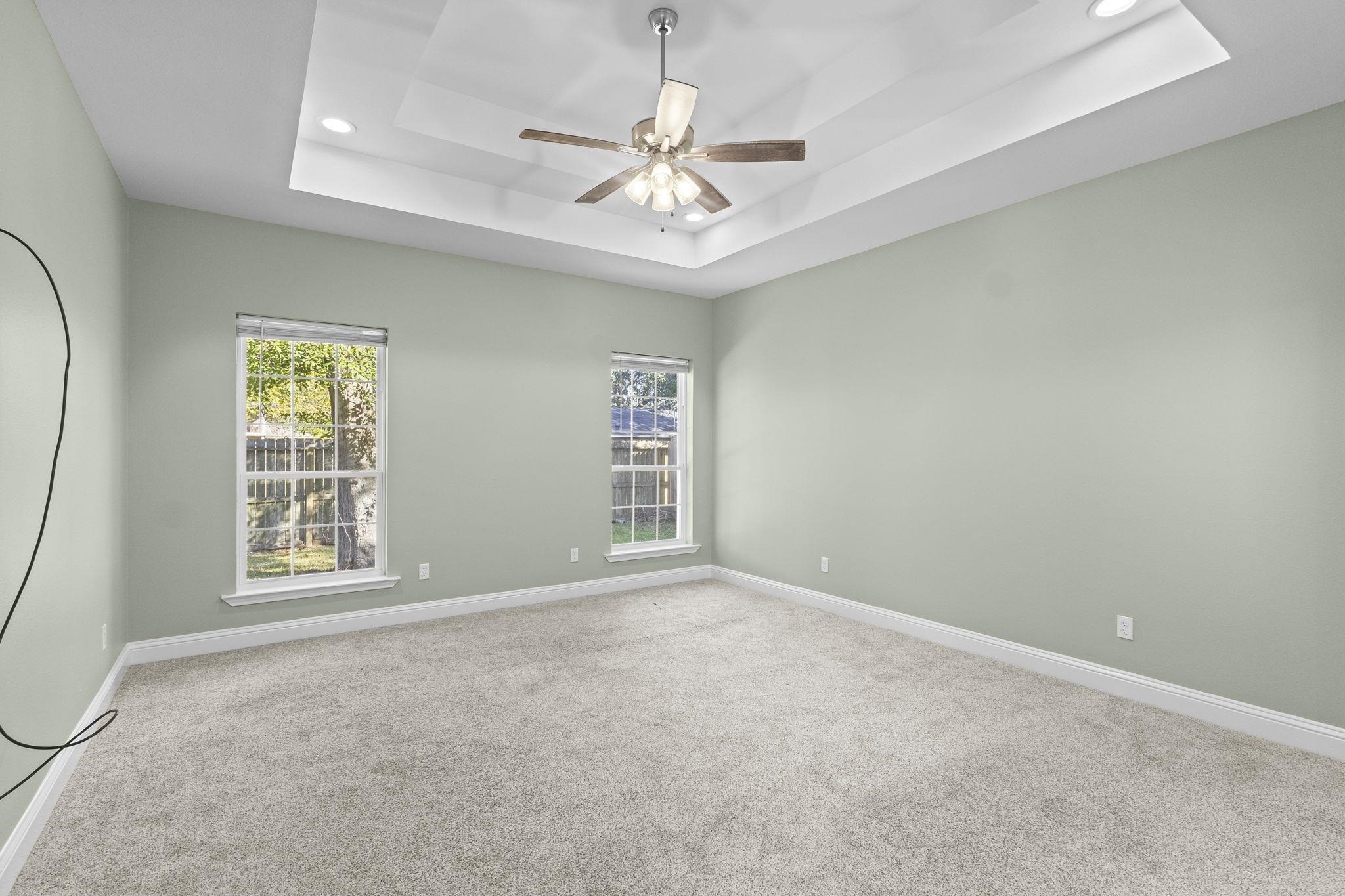790 Bridgeview Street Bridge City, TX 77611 - Photo 14 of 31 an empty room with windows and fan
