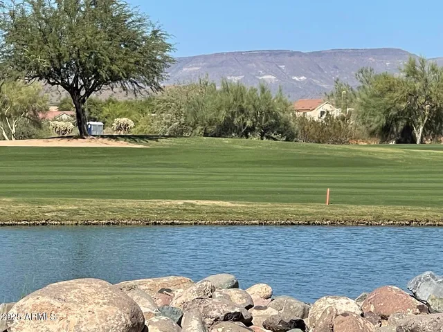 a view of a lake with a mountain