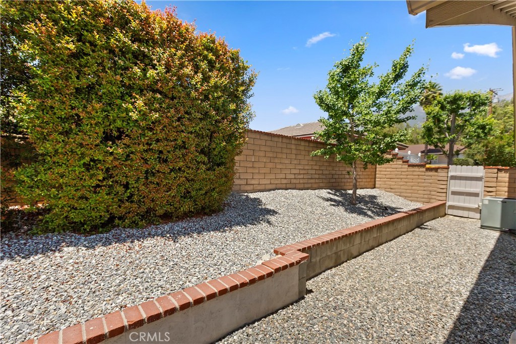 8527 Hillside Road Rancho Cucamonga, CA 91701 - Photo 34 of 50 a view of a backyard of the house