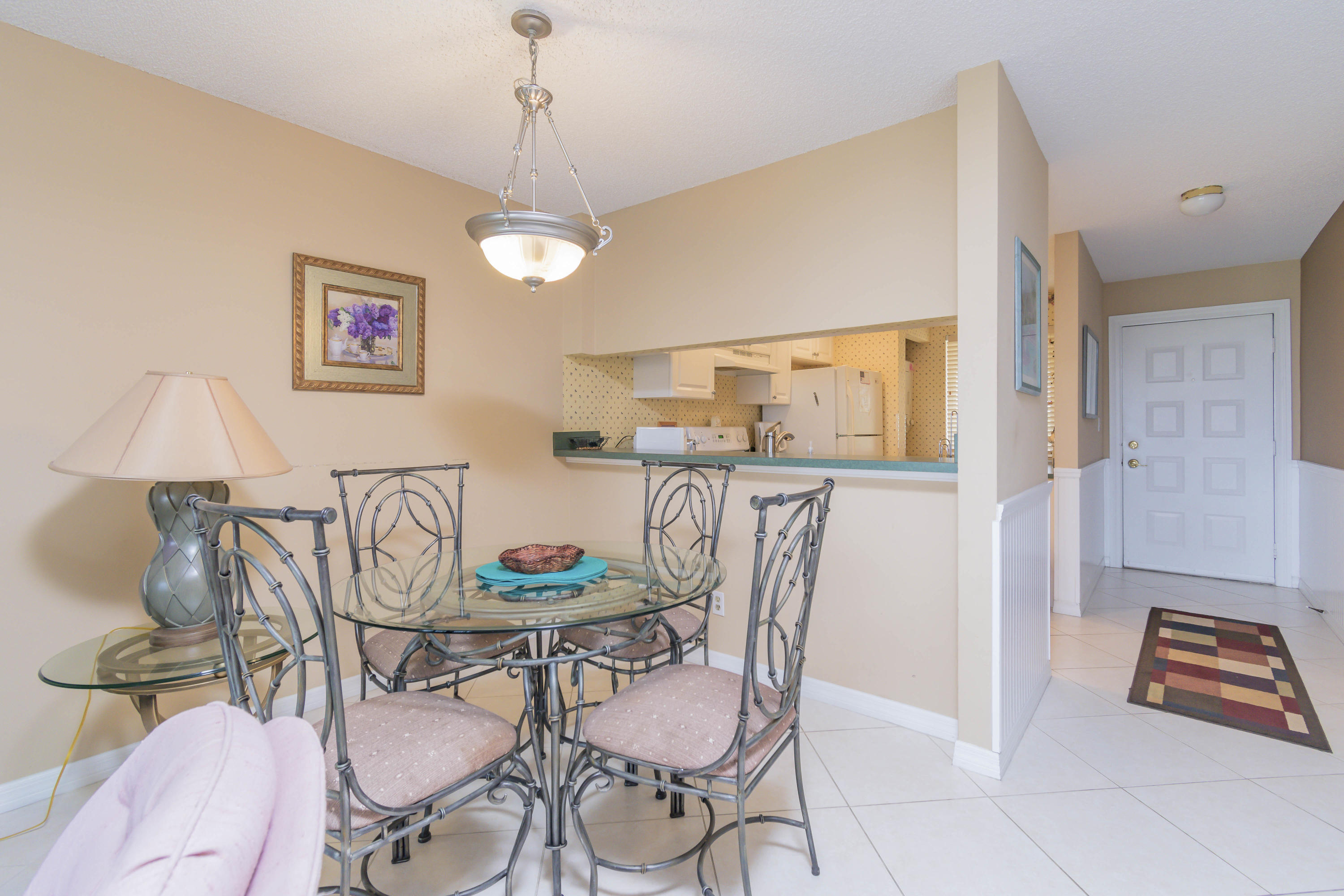 353 Highway 1, Unit F407 Jupiter, FL 33477 - Photo 12 of 30 a dining room with furniture and window