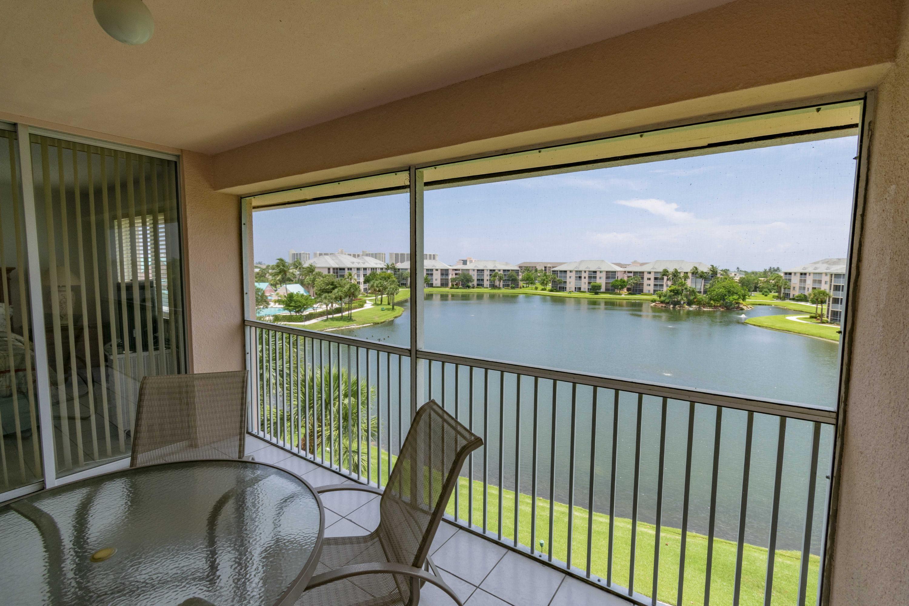 353 Highway 1, Unit F407 Jupiter, FL 33477 - Photo 17 of 30 a view of a chair and table in balcony