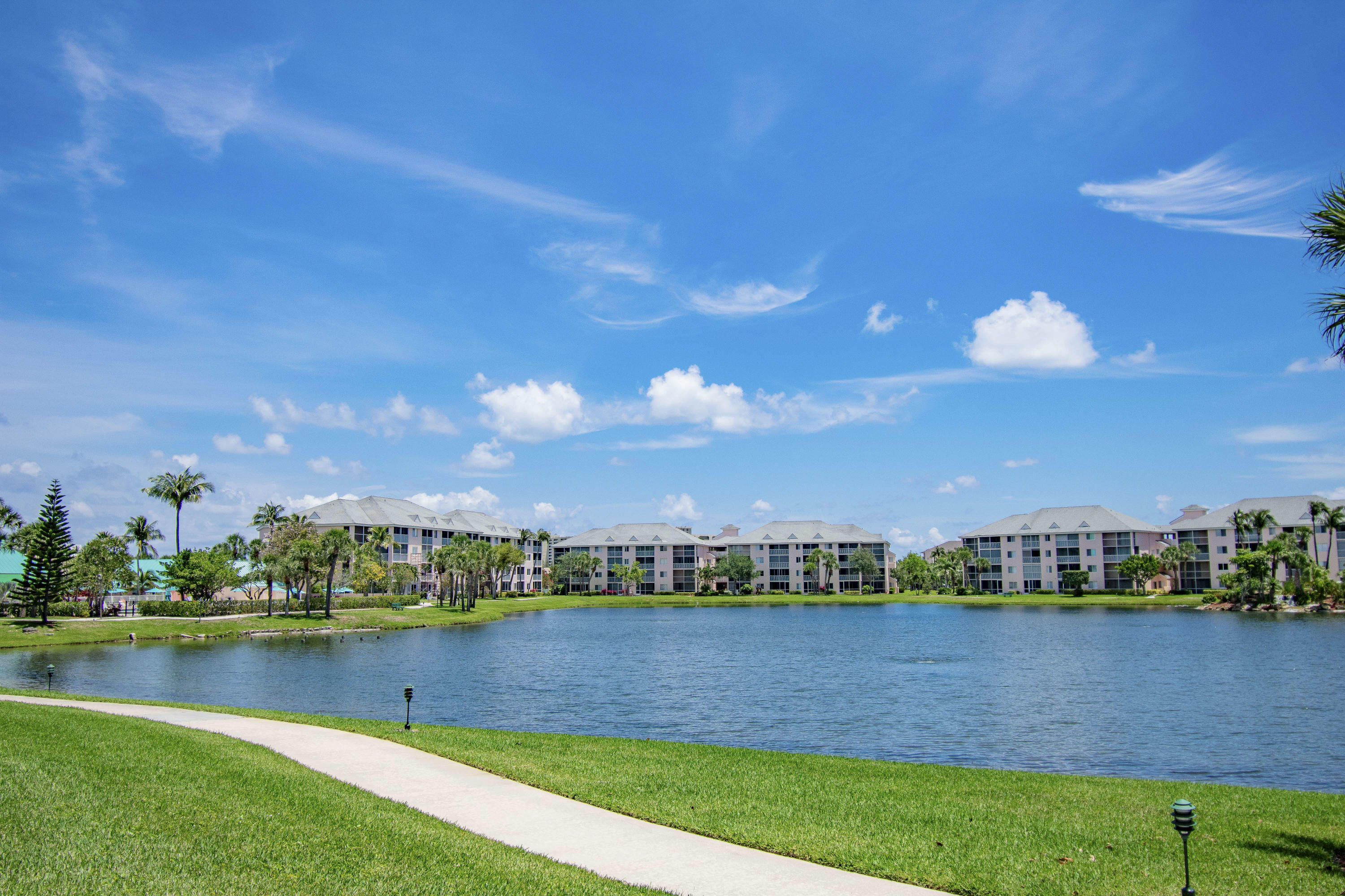 353 Highway 1, Unit F407 Jupiter, FL 33477 - Photo 25 of 30 a view of a lake and houses