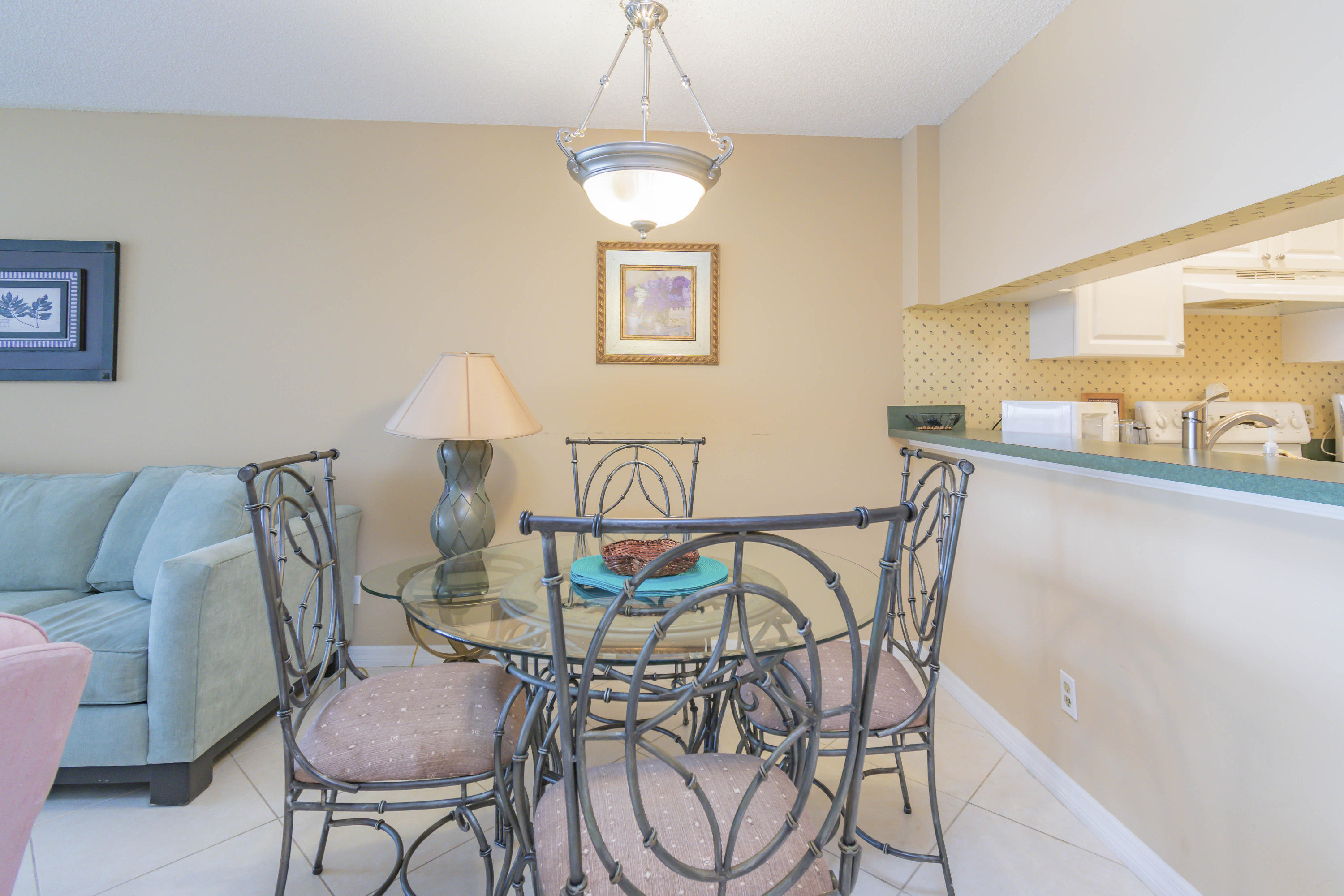 353 Highway 1, Unit F407 Jupiter, FL 33477 - Photo 6 of 30 a view of a dining room with furniture