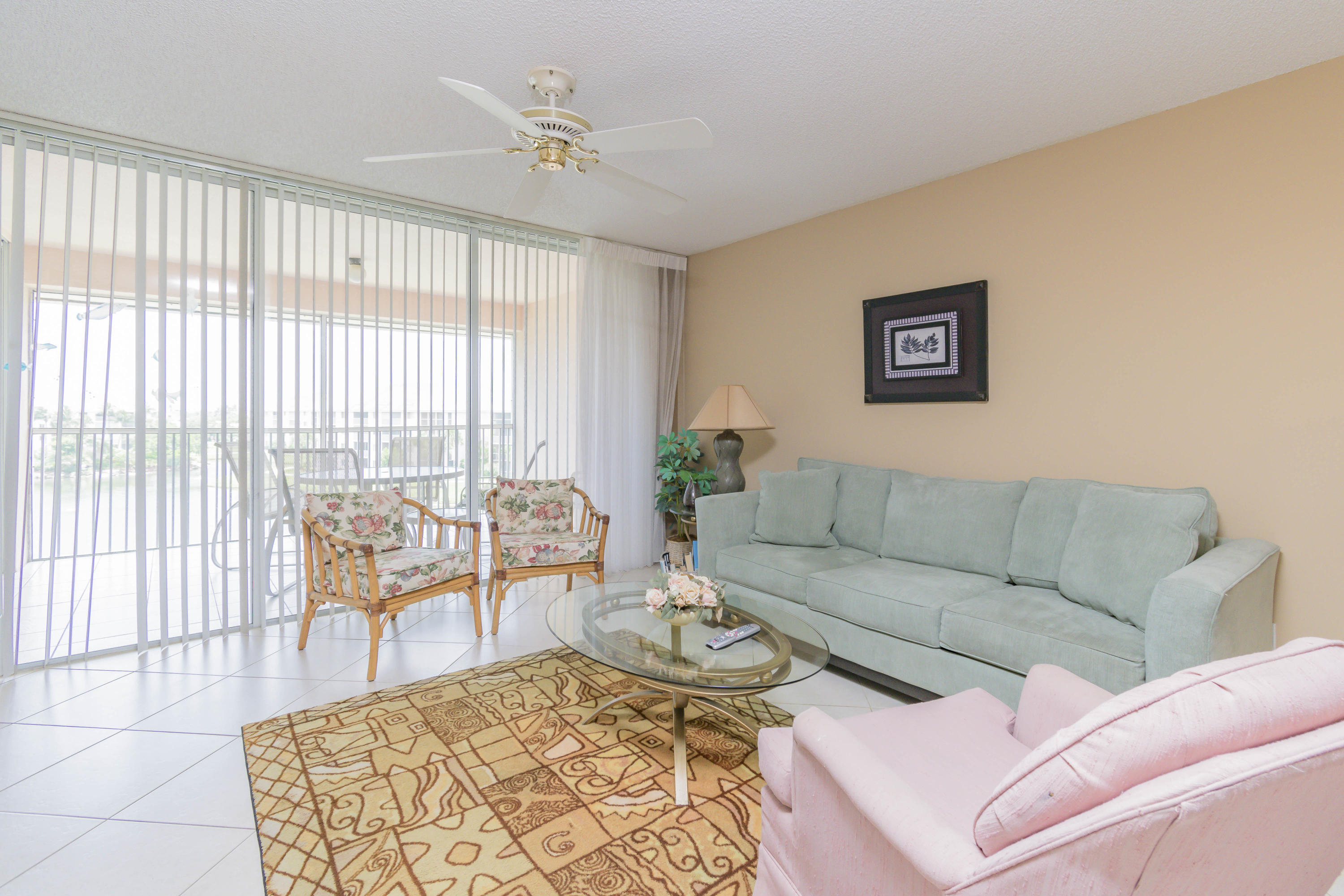 353 Highway 1, Unit F407 Jupiter, FL 33477 - Photo 10 of 30 a living room with furniture and a large window