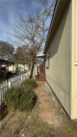 a view of a pathway of a building from a balcony