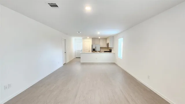 a view of a kitchen and a sink