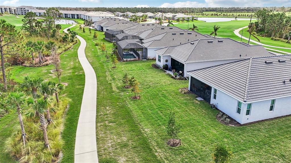 13012 Tulum Loop Venice, FL 34293 - Photo 1 of 1 a view of a house with a yard