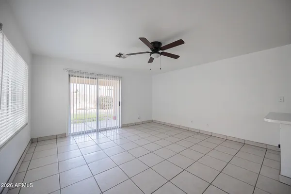 a large kitchen with a stove a sink dishwasher and a refrigerator