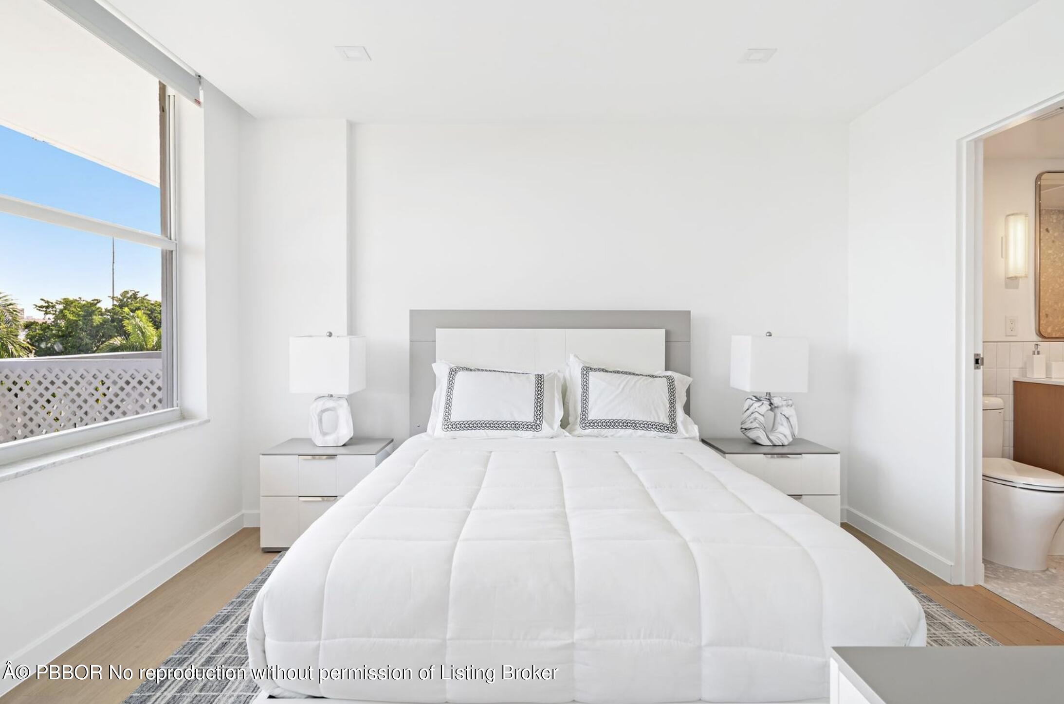 333 Sunset Avenue, Unit 611 Palm Beach, FL 33480 - Photo 13 of 24 a bedroom with a bed and a window