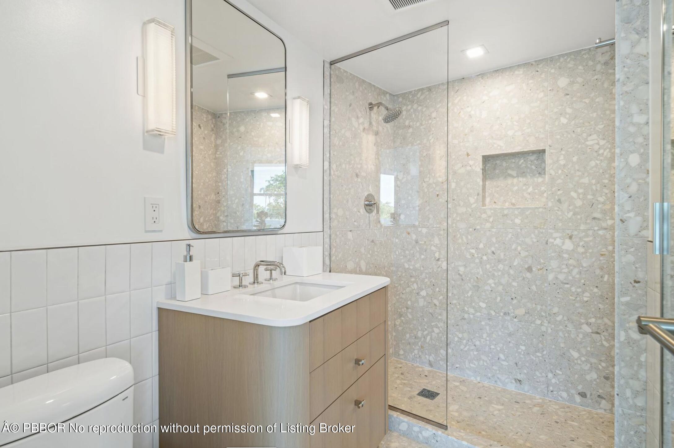 333 Sunset Avenue, Unit 611 Palm Beach, FL 33480 - Photo 15 of 24 a bathroom with a sink a toilet and shower