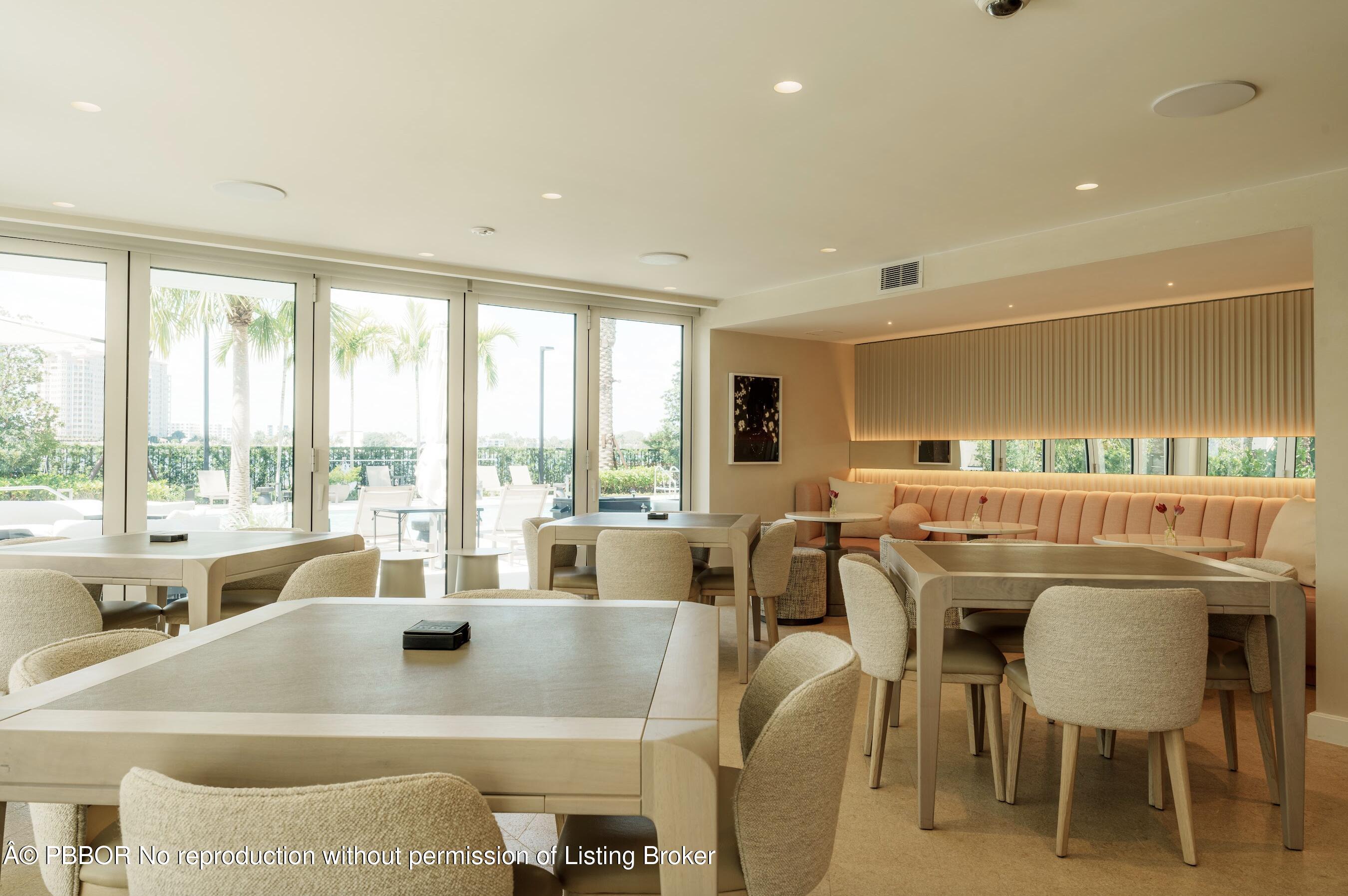 333 Sunset Avenue, Unit 611 Palm Beach, FL 33480 - Photo 19 of 24 a view of a dining room with furniture window and outside view