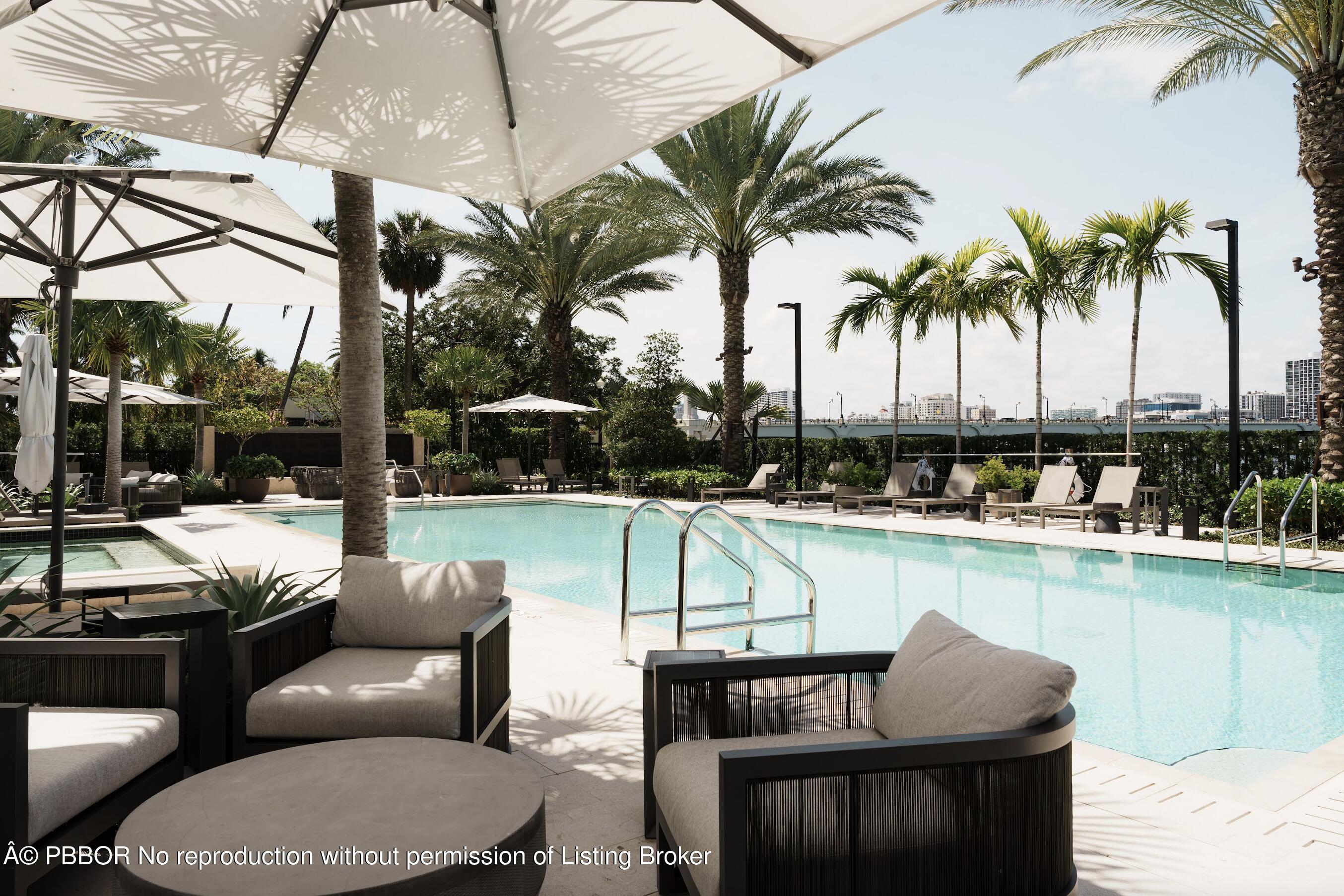 333 Sunset Avenue, Unit 611 Palm Beach, FL 33480 - Photo 22 of 24 a balcony with furniture and a potted plant