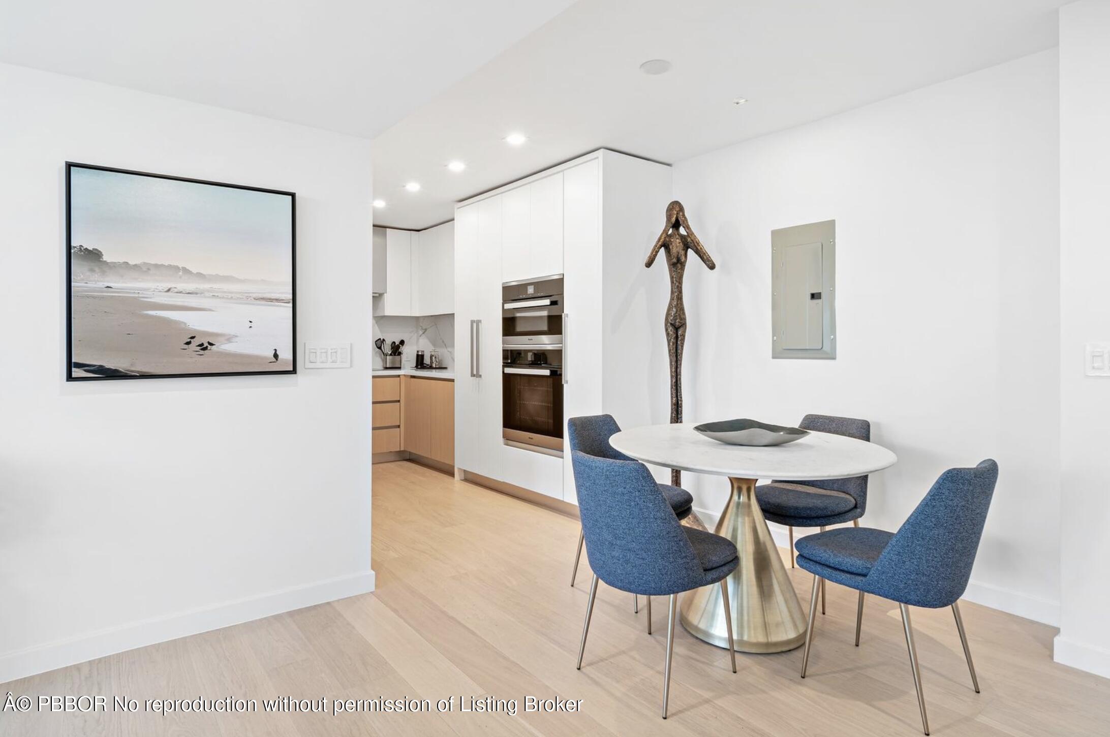 333 Sunset Avenue, Unit 611 Palm Beach, FL 33480 - Photo 5 of 24 a view of a dining room with furniture