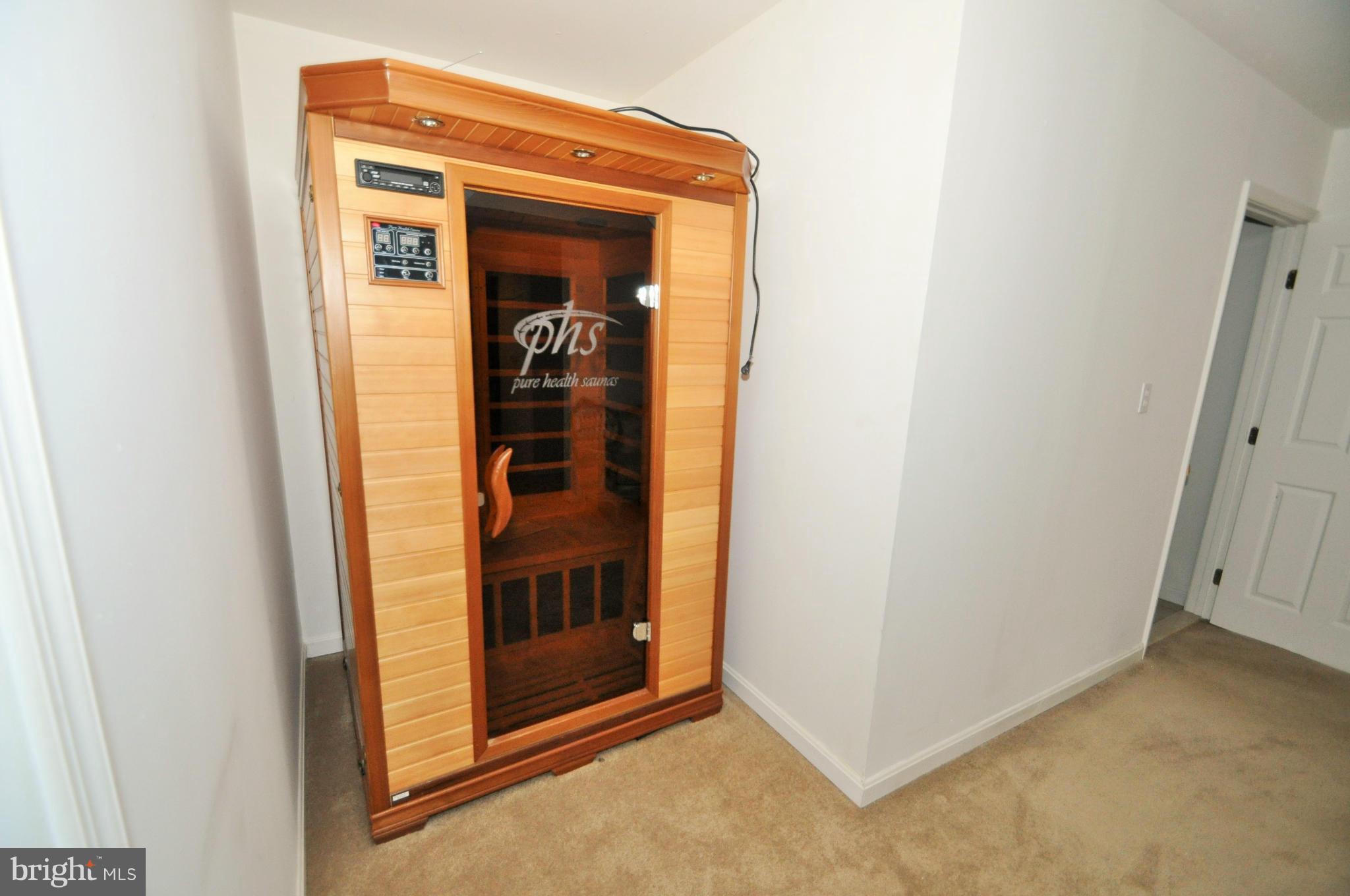 13718 Baldwin Mill Road Baldwin, MD 21013 - Photo 24 of 29 a view of a hallway with wooden door