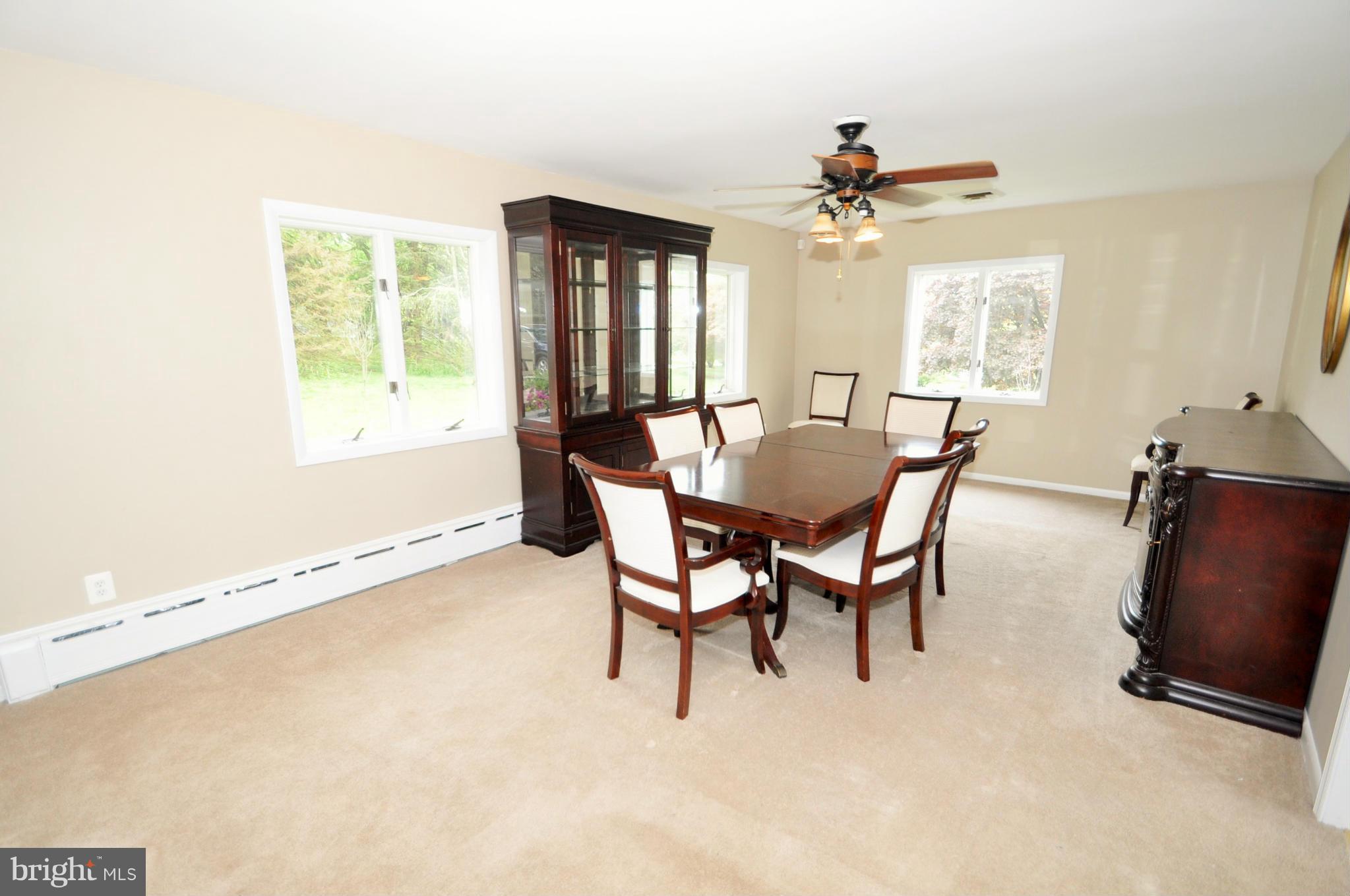 13718 Baldwin Mill Road Baldwin, MD 21013 - Photo 10 of 29 a view of a dining room with furniture and a window