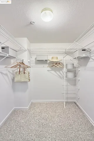 a view of a room with racks on the wall