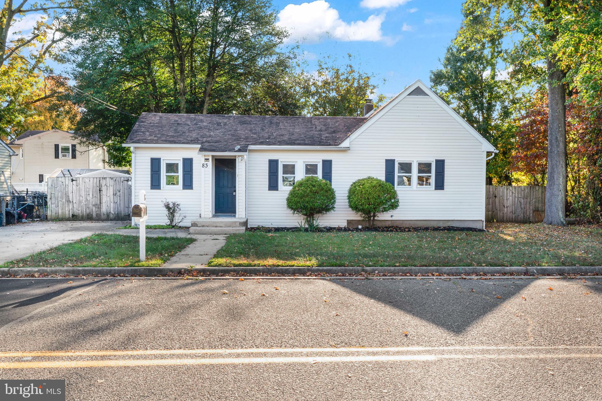 83 Rutgers Road Pennsville, NJ 08070 - Photo 2 of 23 front view of a house and a yard