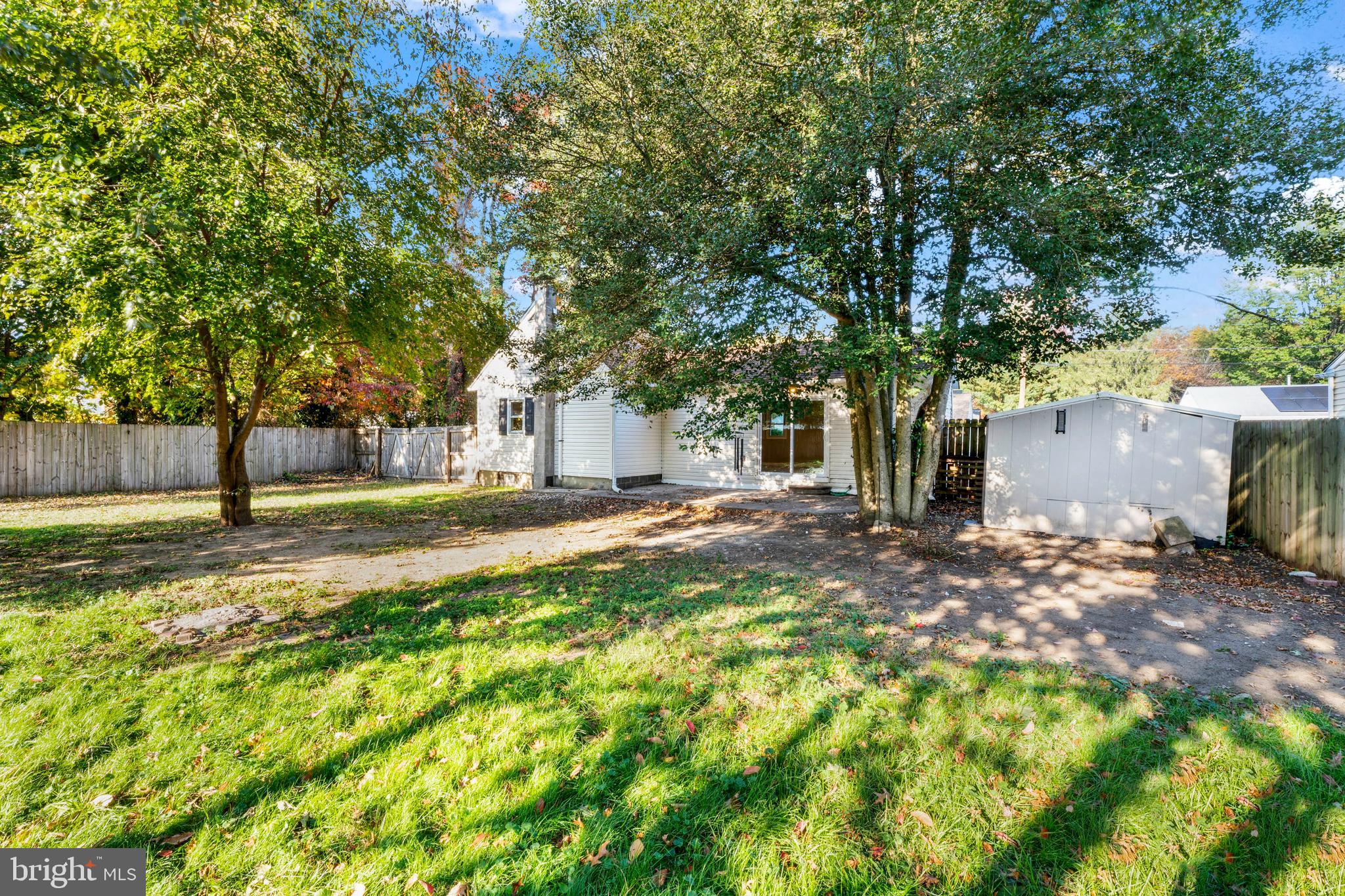 83 Rutgers Road Pennsville, NJ 08070 - Photo 22 of 23 a view of a yard with a tree