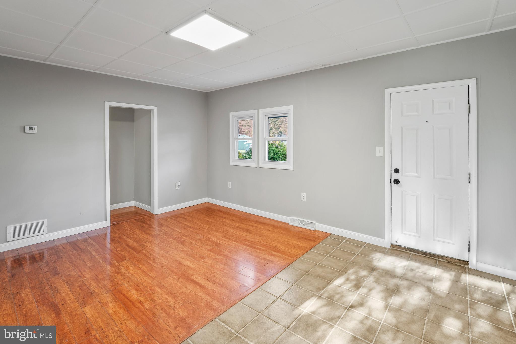 83 Rutgers Road Pennsville, NJ 08070 - Photo 8 of 23 a view of empty room with window